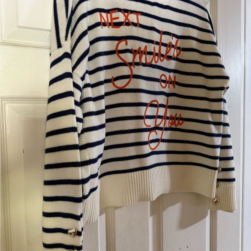 Striped White and Blue Sweater with Orange Accents